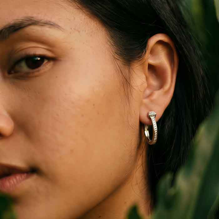 Horseshoe Nail Hoop Earrings in Sterling Silver shown on horse lover