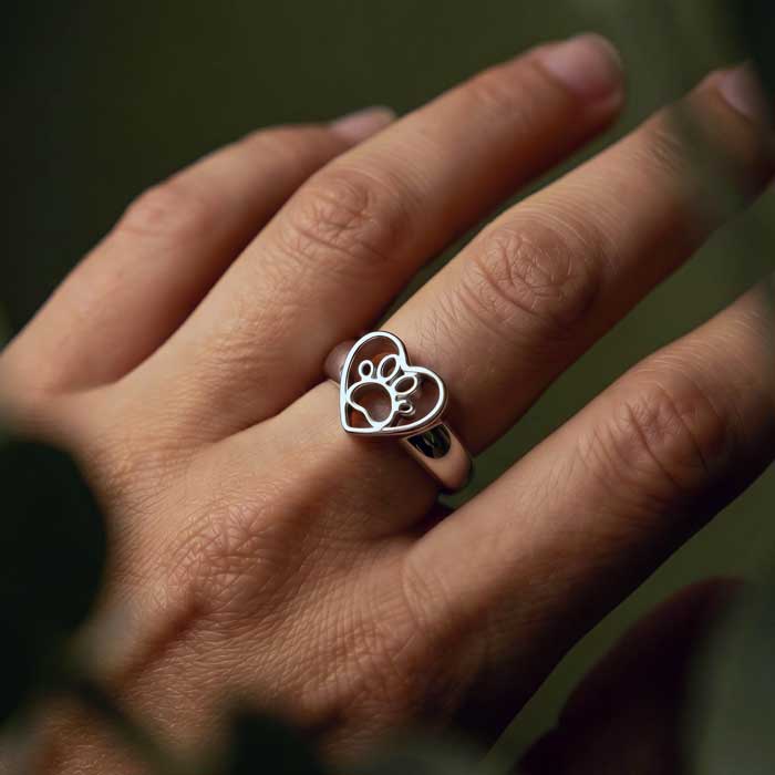 Open Paw Print in Heart Ring Sterling Silver shown on hand