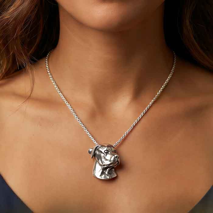 Rottweiler Pendant Necklace In Sterling Silver shown on dog lover's neck