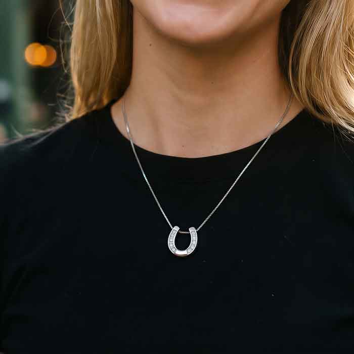 Sparkling Horseshoe Necklace Sterling Silver with CZ shown on equestrian