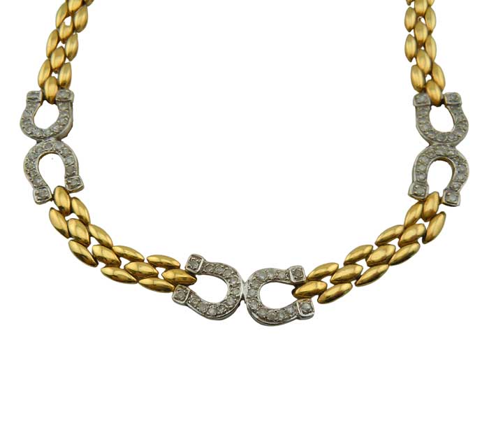 14k Gold horseshoe bracelet and necklace set detail of horseshoe links