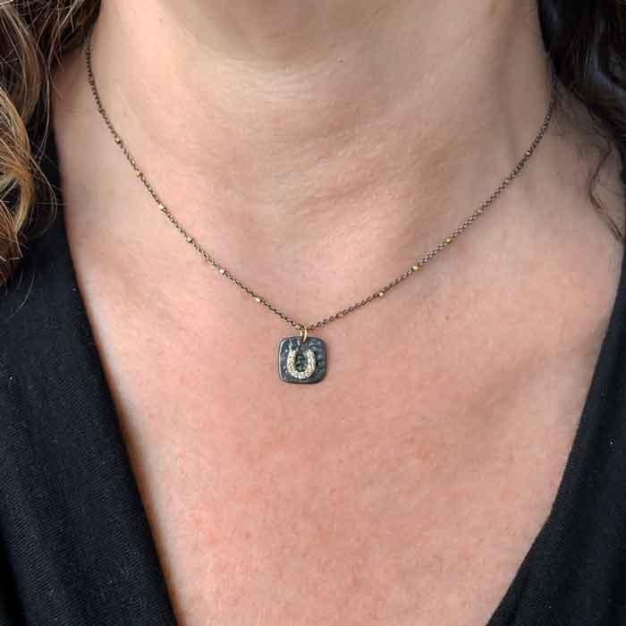 lucky in life horseshoe necklace show on neck