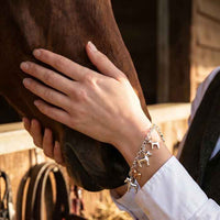 Chunky Pony Charm Bracelet Sterling Silver and Bronze shown on wrist of horse lover
