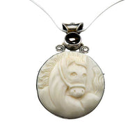 Cara carved horse head pendant necklace  with topaz accent