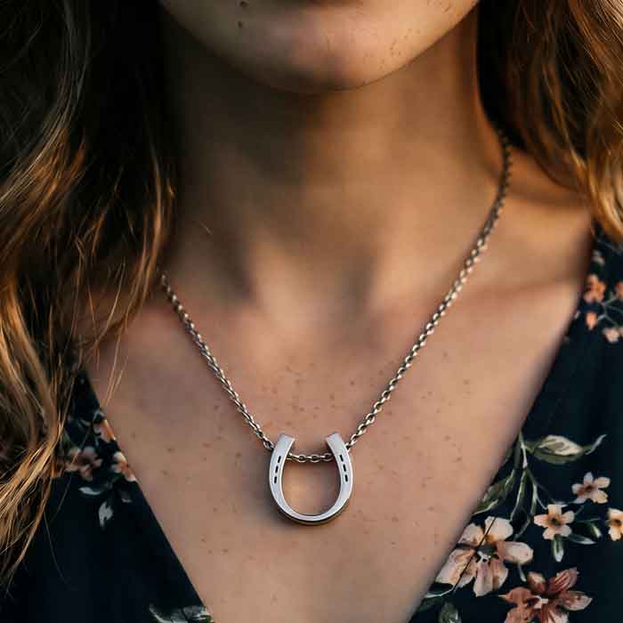 Classis horsehoe pendant necklace in sterling silver on model