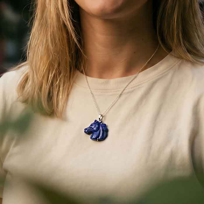 dark sky lapis horse head pendant necklace shown on person