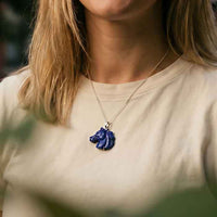 dark sky lapis horse head pendant necklace shown on person