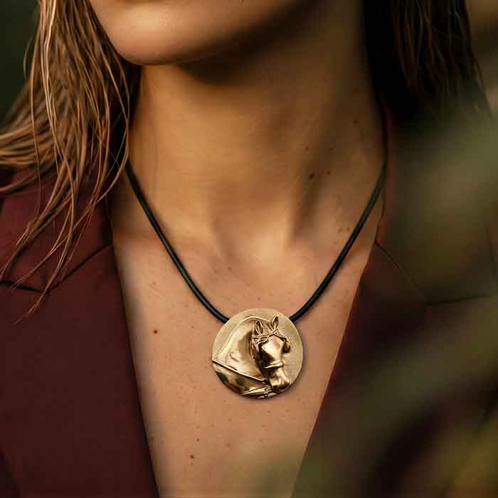 Driving pony necklace in Bronze show on person