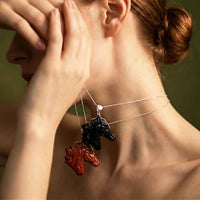Jasper and Obsidien carved horse head pendant on sterling silver chains show on person