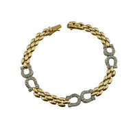 14k Gold horseshoe bracelet and necklace set. Shown is bracelet