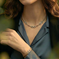 14k Gold horseshoe bracelet and necklace set shown a horse lover