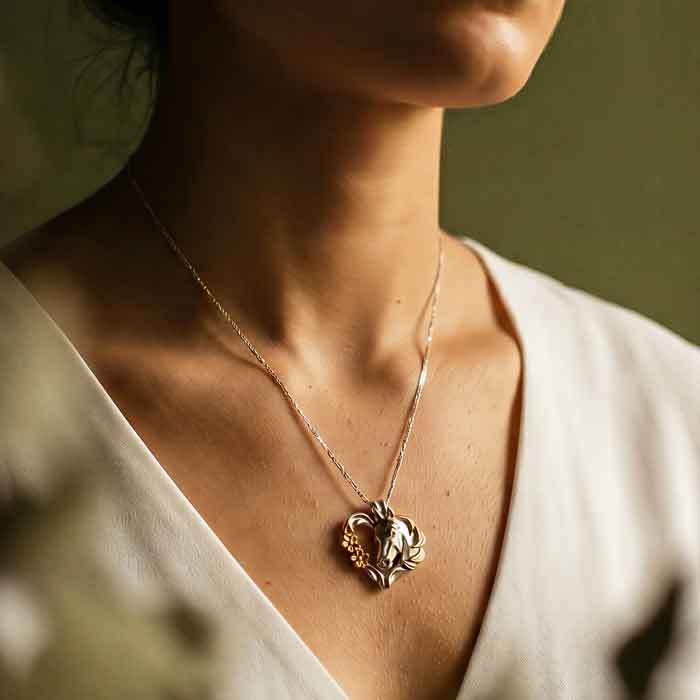 Heart of Gold Horse Pendant Necklace Sterling Silver shown on horse lover's neck