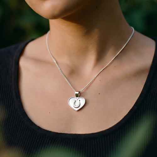 Horseshoe on Heart Pendant Necklace sterling silver shown on horse lover