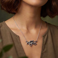 Herd of Four Horses Necklace Sterling Silver shown on horse lover