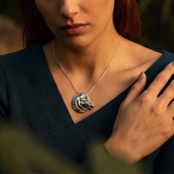 Ive Horse head pendant necklace pin in sterling silver shown on person