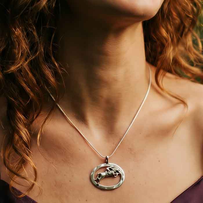 Jumping Horse and Rider Necklace Sterling Silver in oval hown on neck of horse lover