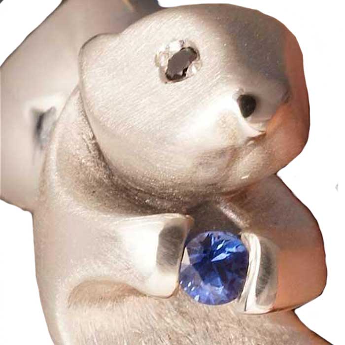 Otter Ring in Sterling Silver close up view of face and stone