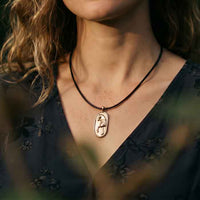 oval dressage horse necklace pendant sterling silver on horse lover shown in bronze