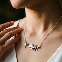 Racing the moon horse necklace sterling silver on model