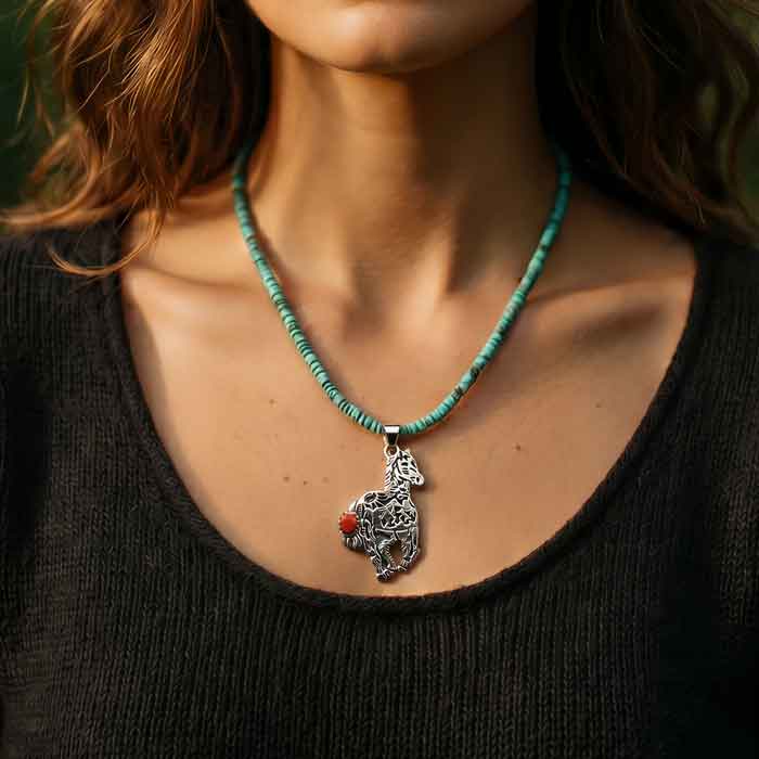 Storyteller horse pendant sterling silver on turquoise necklace shown on person