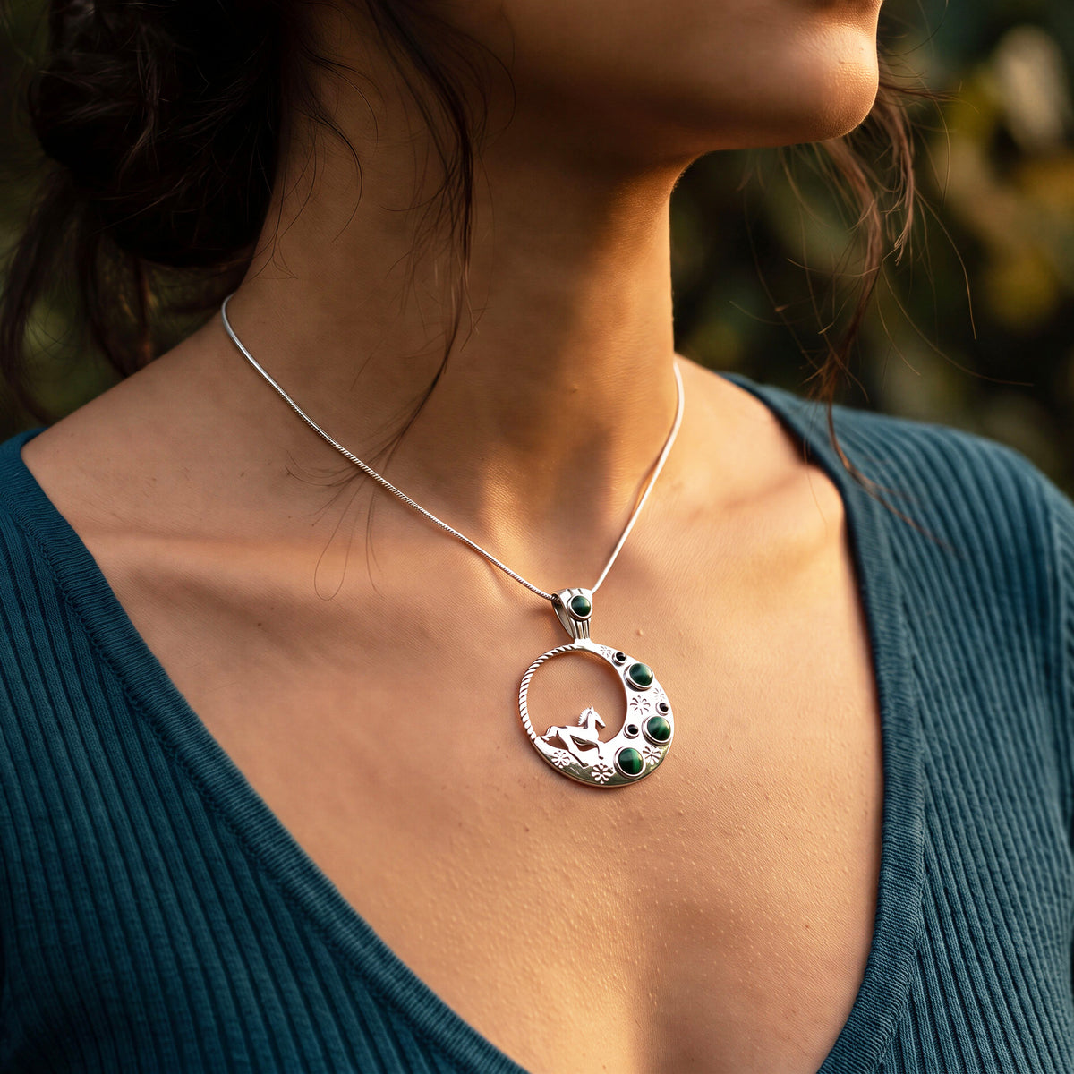 Horse and Half-Moon Necklace with Malachite and Onyx shown on horse lover