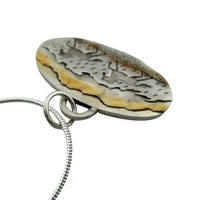 Horses Racing Across Landscape Pendant Necklace Sterling Silver showing the layers and depth