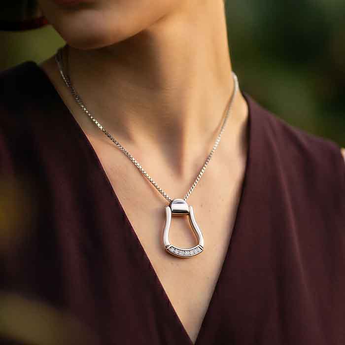 Western Stirrup Necklace in Sterling Silver with CZs on model