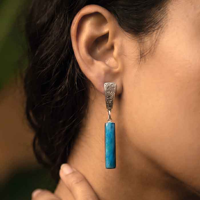 Western Style Earrings with Turquoise Dangles sterling silver on person
