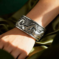 Wide Flowing Horses Cuff Bracelet - on model
