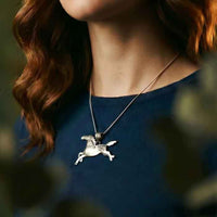 Sprinkles appaloosa horse necklace in sterling silver shown on person