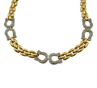 14k Gold horseshoe bracelet and necklace set detail of horseshoe links