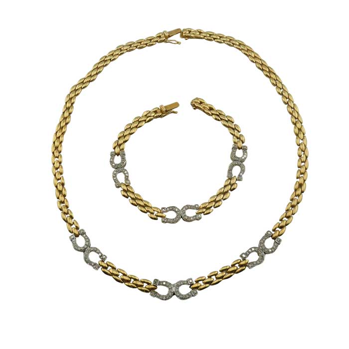 14k Gold horseshoe bracelet and necklace set. 