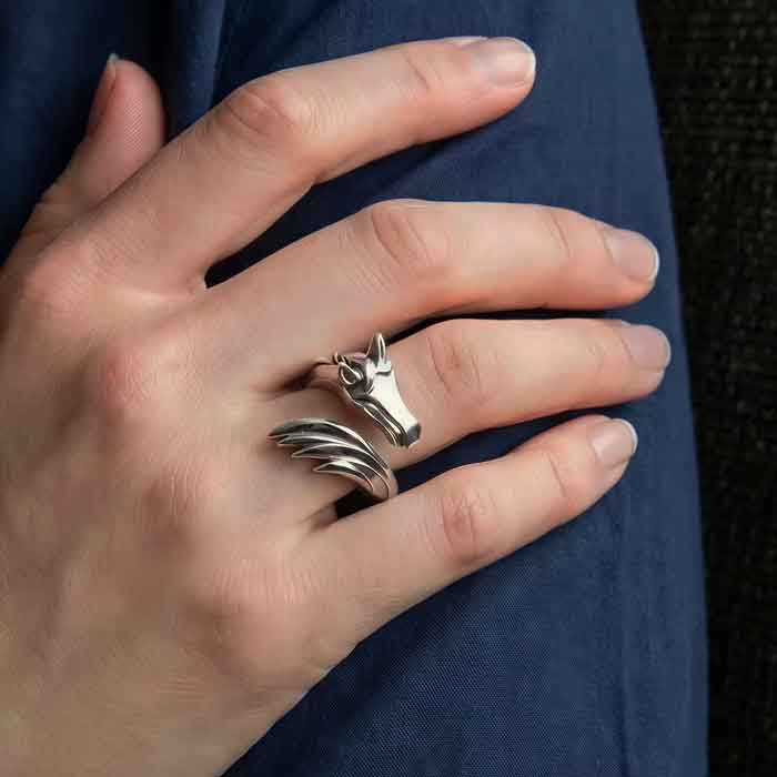 Horse Head and Tail Ring in Sterling Silver  shown on hand of horse lover