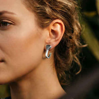 Horseshoe Nail Earrings Sterling Silver shown on woman