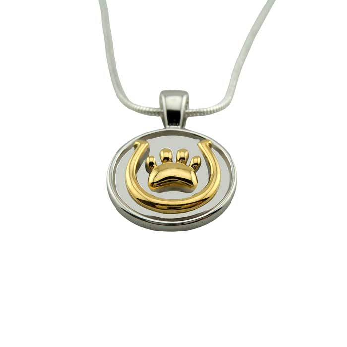 Horseshoe and Paw Print Pendant Necklace, 18k Gold  and Sterling Silver show at angle emphasizing depth