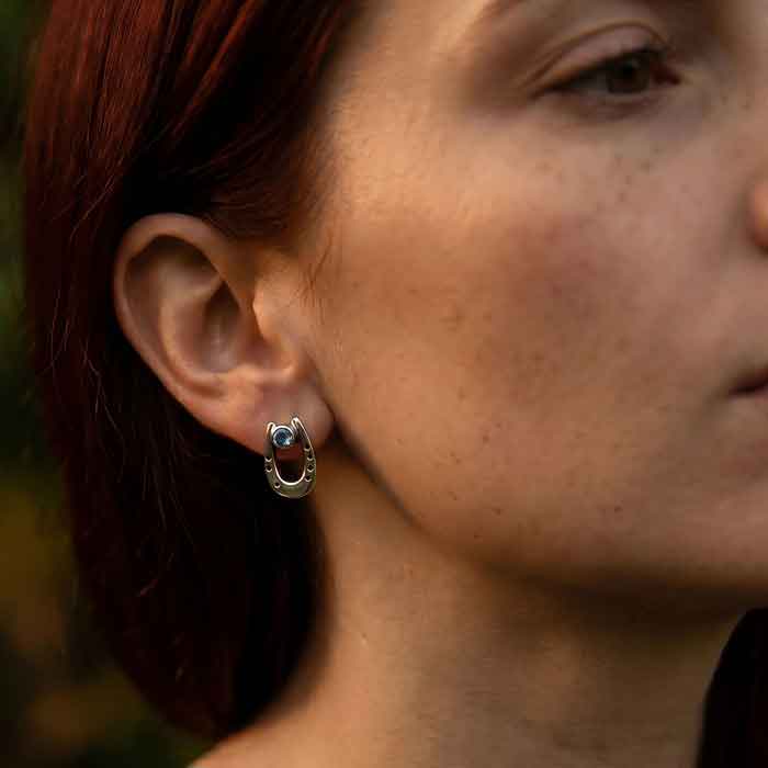 Blue Topaz Horseshoe Earrings Sterling Silver shown on horse lover