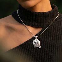 Howling Wolf at Moon Pendant Necklace Sterling Silver shown on woman