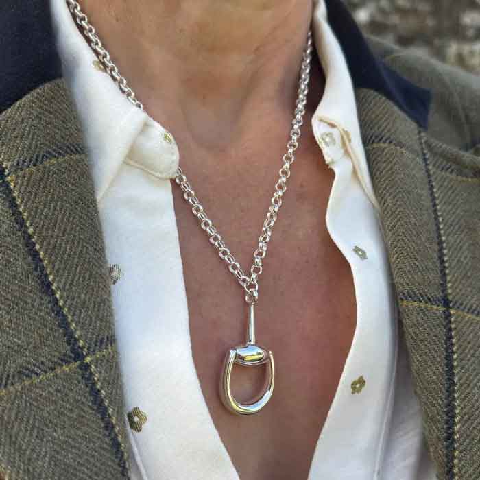 oversized half snaffle bit necklace in all sterling silver shown on person