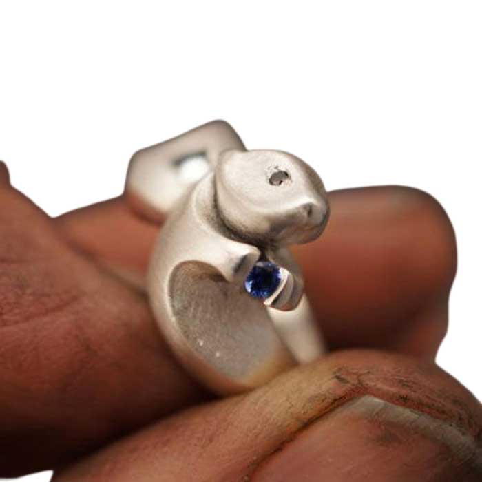 Otter Ring in Sterling Silver close up view of face and stone
