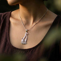 Sitting Cat Pendant Necklace Sterling Silver shown on neck of woman