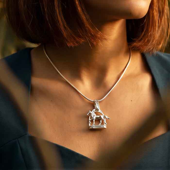 Stirrup and Horse Necklace Sterling Silver shown on person