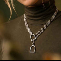 Stirrup Lariat Necklace Sterling Silver shown on person's neck