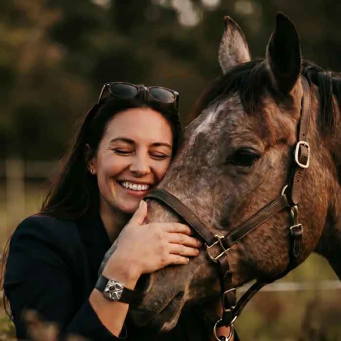 sterling Silver jumper on leather cuff bracelet show on horse lovers wrist