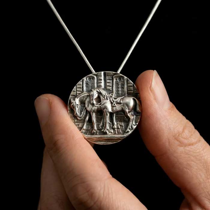 Pair of Saddled Horses Pendant and Pin Sterling Silver hand holding 