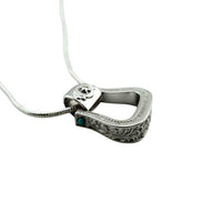 Western Stirrup Pendant Necklace Sterling Silver with turquoise accent shown side to highlight the intricate design that is like leather tooling