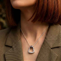 Western Stirrup Pendant Necklace Sterling Silver shown on horse lovers neck