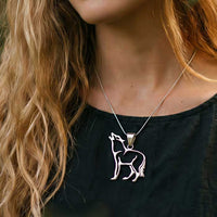 Wolf Pendant Necklace in Sterling Silver shown on woman